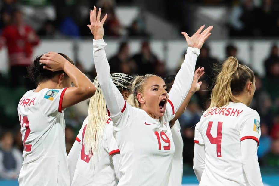 Canadian forward Adriana Leon celebrates after scoring her team's second goal against Ireland.