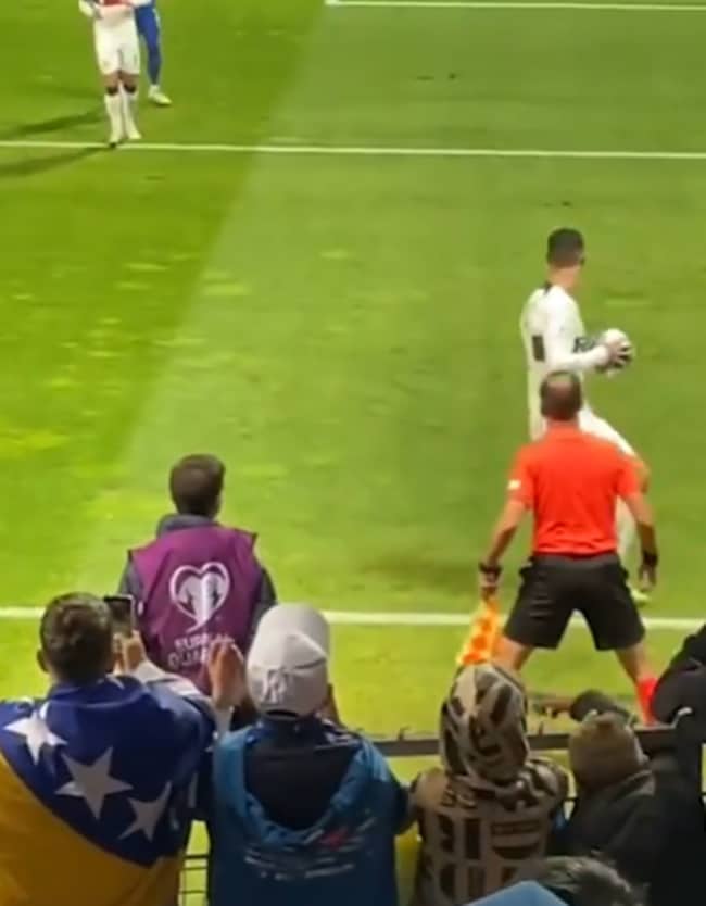 Shocking moment furious Cristiano Ronaldo is hurt by pitch invader trying to take selfie during Portugal clash - Bóng Đá